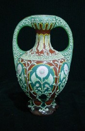 Appraisal: A th century Eastern European twin handled vase with applied