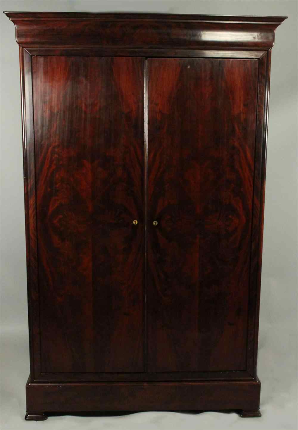 Appraisal: LOUIS PHILLIPE MAHOGANY ARMOIRE all French polished having a molded