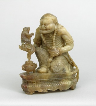 Appraisal: A Finely Carved Soapstone Carving of a Man and Monkey