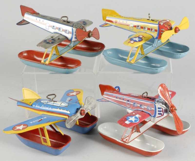 Appraisal: Lot of Tin Litho Chein Airplane Wind-Up Toys Description American