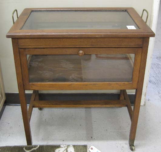 Appraisal: AN OAK AND GLASS PASTRIES CABINET CART English early th