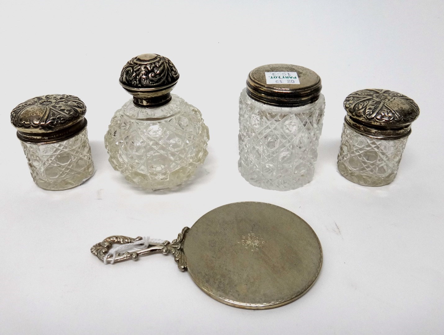 Appraisal: A silver topped faceted spherical glass scent bottle Birmingham three