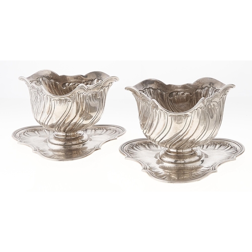 Appraisal: A pair of Danish silver triple lipped sauce bowls on