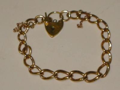 Appraisal: A CT GOLD BRACELET the wide curb link fastened with