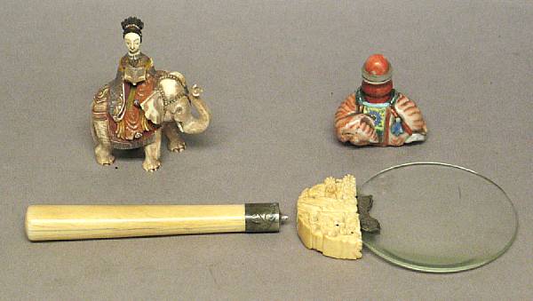 Appraisal: Two snuff bottles and an ivory-handled magnifying glass One of