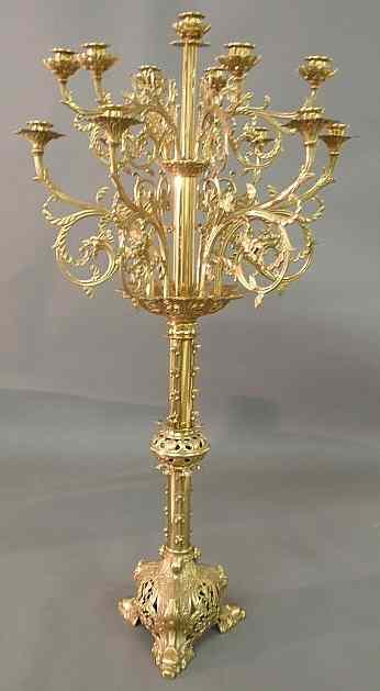 Appraisal: Large brass two-tier candelabra with dragon head feet th c