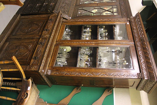 Appraisal: A VICTORIAN OAK CHIP CARVED DECORATED LIBRARY BOOKCASE the glazed