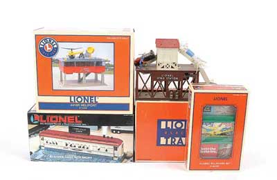 Appraisal: Lionel O Gauge Railway accessories consisting of HELIPORT Operating Ice