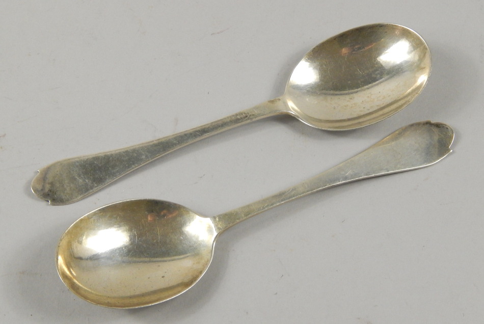 Appraisal: A pair of Edwardian silver trefid handle spoons with a