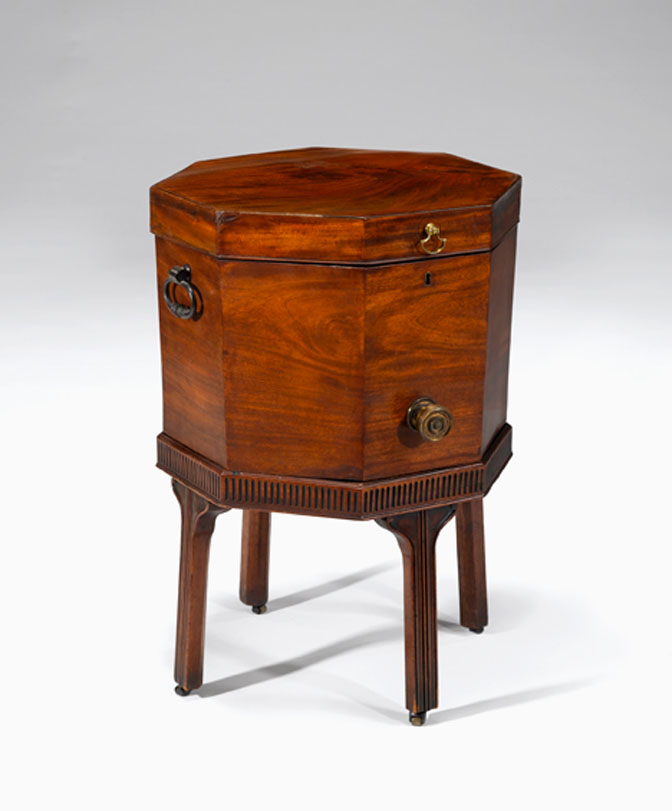 Appraisal: George III mahogany cellarette circa Of octagonal form the hinged