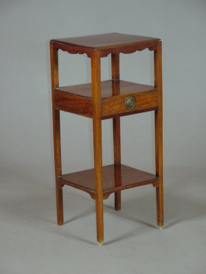 Appraisal: A late George III mahogany three tier washstand with wavy