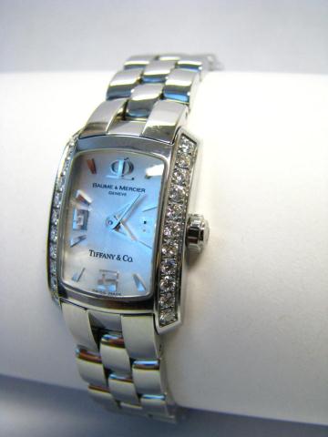 Appraisal: Co-branded Tiffany Baume Mercier Lady's stainless watch with diamond accents