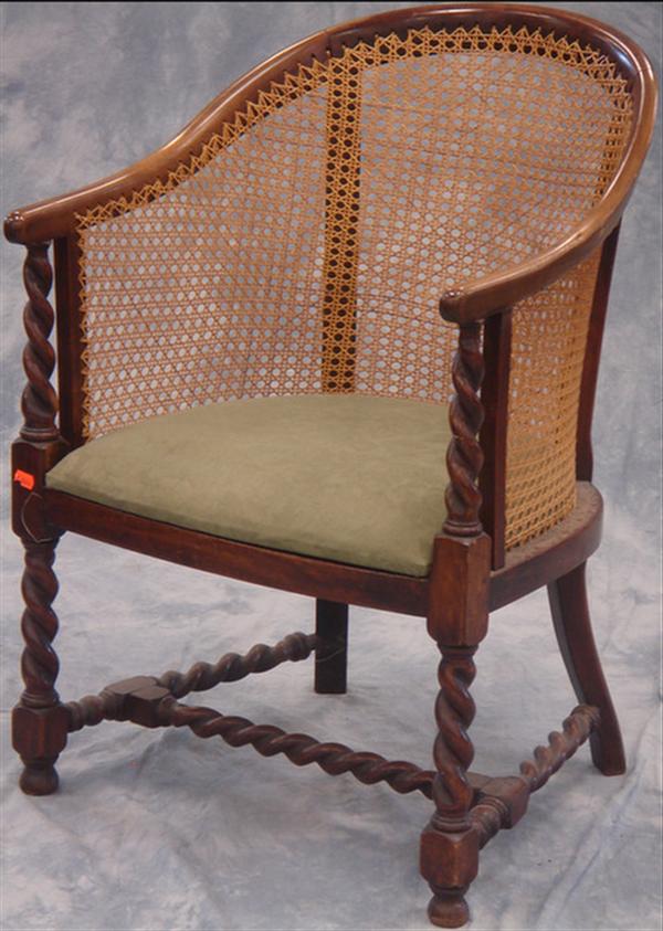 Appraisal: Mahogany Edwardian barley twist armchair with caned back Estimate -