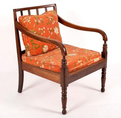 Appraisal: A Regency open arm chair with cane seat on turned