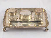 Appraisal: A late Victorian silver inkstand on four claw and ball