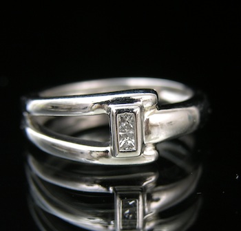 Appraisal: A Platinum and Diamond Ring A platinum ring with a