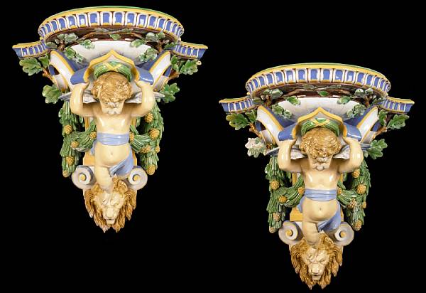 Appraisal: A pair of Continental majolica figural wall brackets late th