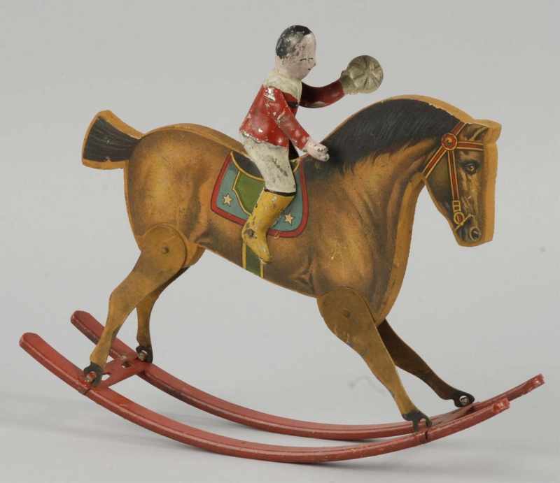 Appraisal: Early Gibbs Rocking Horse Toy Description American Handpainted tin figures