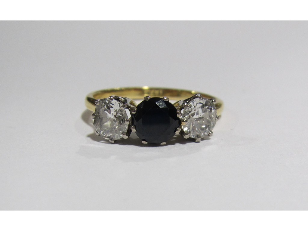 Appraisal: An ct gold sapphire and diamond three stone ring with