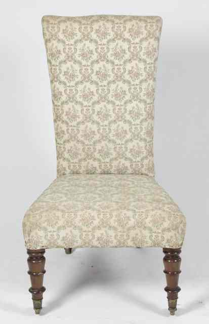 Appraisal: A Victorian upholstered chair on turned legs