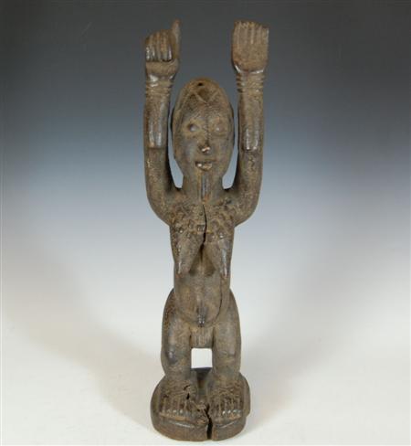 Appraisal: Ethnographic Interest A carved wood figure with raised arms probably