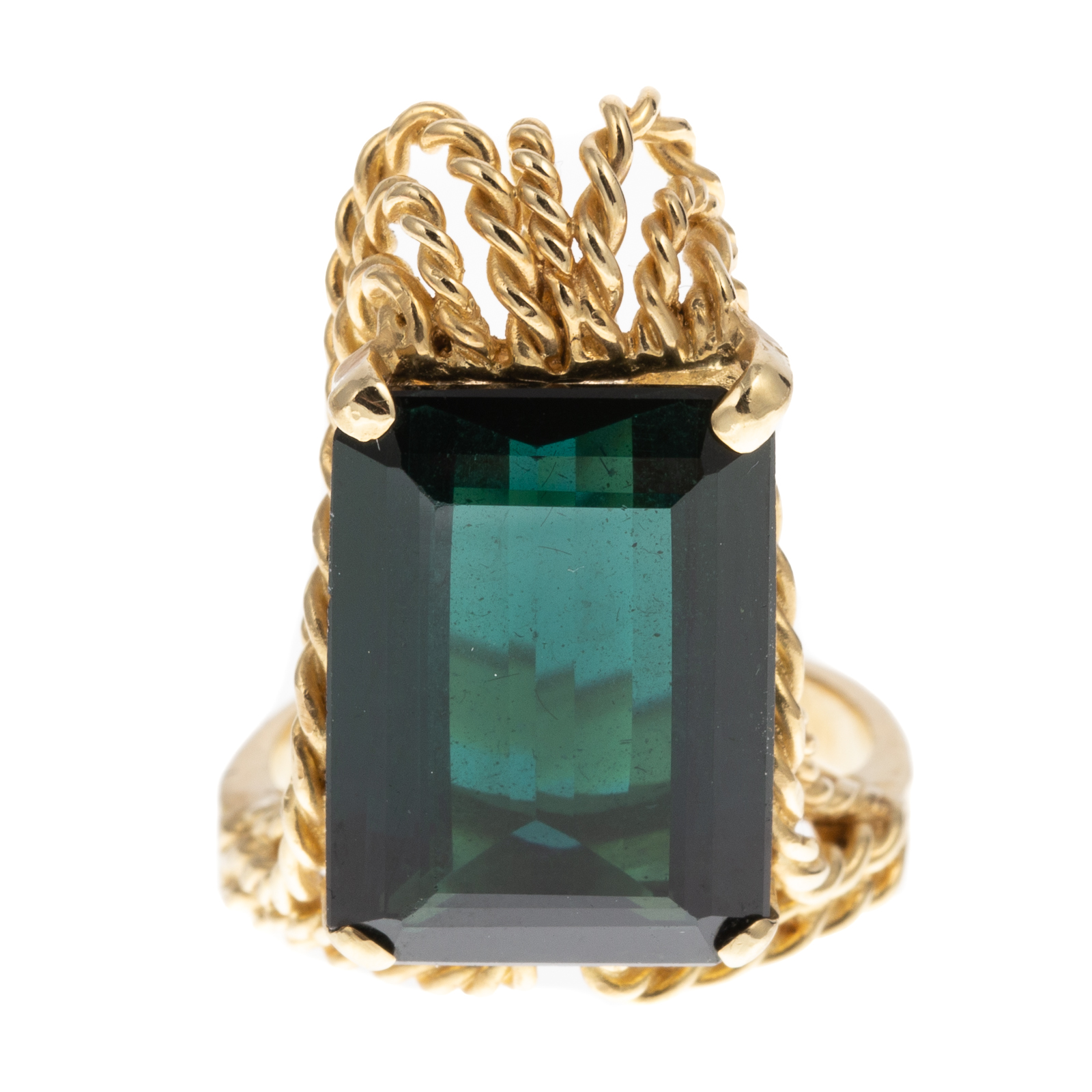 Appraisal: A GREEN TOURMALINE STATEMENT RING IN K K yellow gold