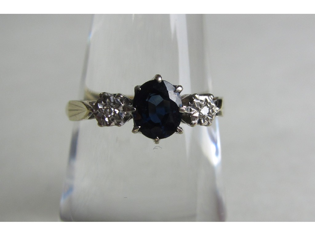 Appraisal: Eighteen carat gold sapphire and diamond three stone ring