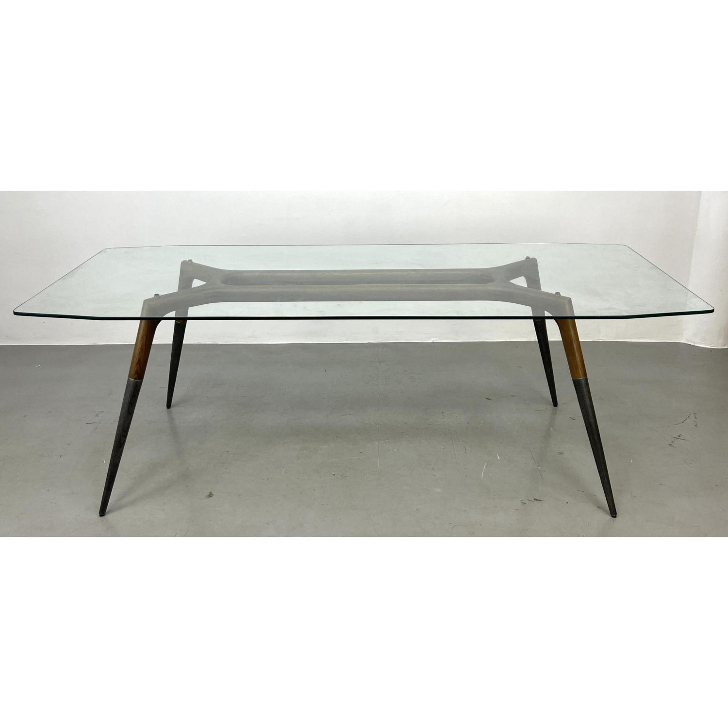 Appraisal: Contemporary Gio Ponti style Glass Top Dining Table Elegant Tapered