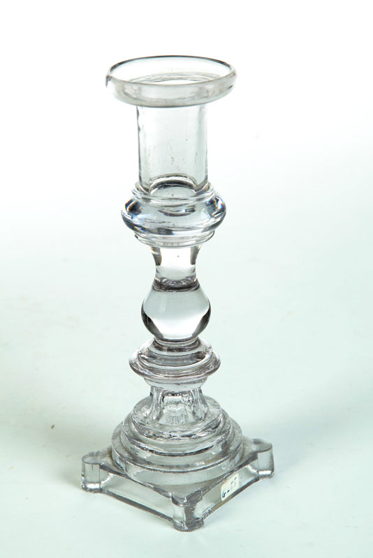 Appraisal: GLASS CANDLESTICK Sandwich st half- th century Pressed base with