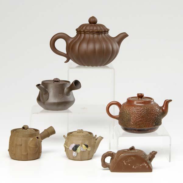 Appraisal: COLLECTION OF ASIAN TEAPOTS Six pieces Yixing ribbed melon teapot