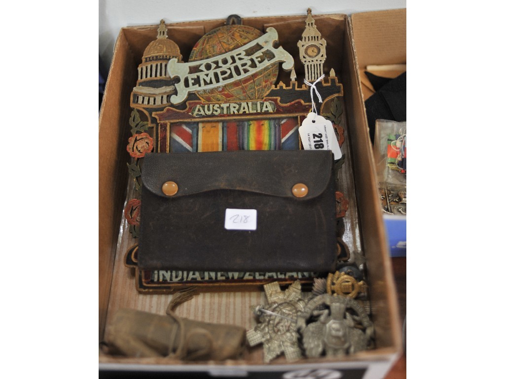 Appraisal: Lot comprising mounted war medal and defence medal cap badges