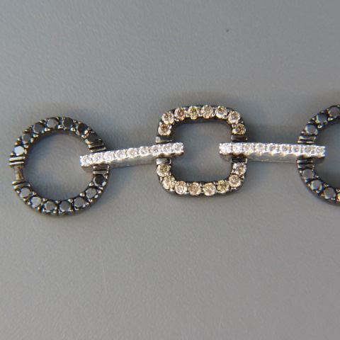 Appraisal: Diamond Bracelet round diamonds totaling carats white fancy champagne black