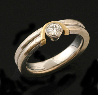 Appraisal: A gold and diamond ring bu Georg Jensen The ct