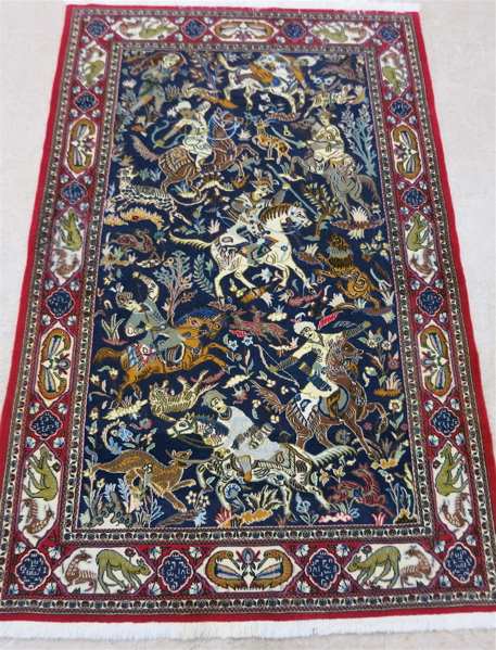 Appraisal: PERSIAN HUNTING SCENE AREA RUG Qom Province northern Iran hunters