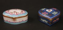 Appraisal: Two Hand Painted Porcelain Snuff Boxes A pair of hand-painted