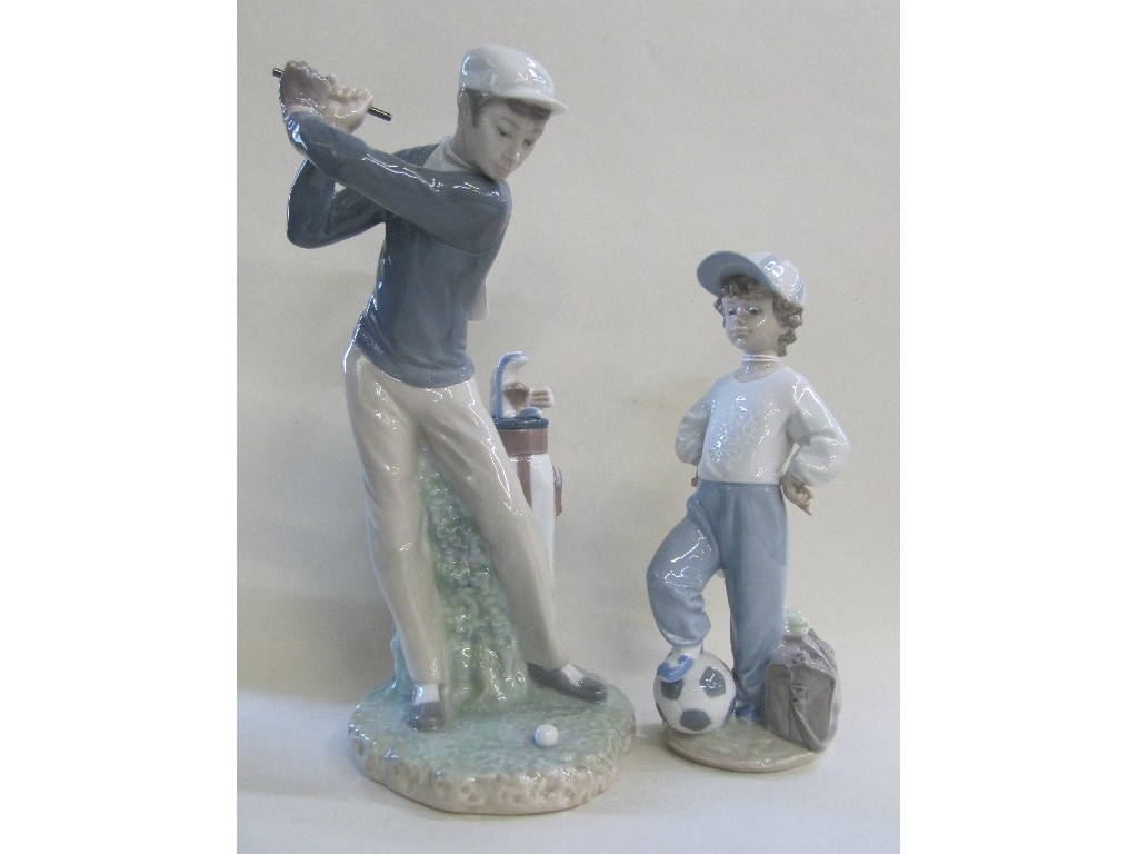 Appraisal: Two Lladro figures of a golfer and a young footballer