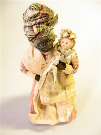 Appraisal: A handmade mammy doll with baby late th early th