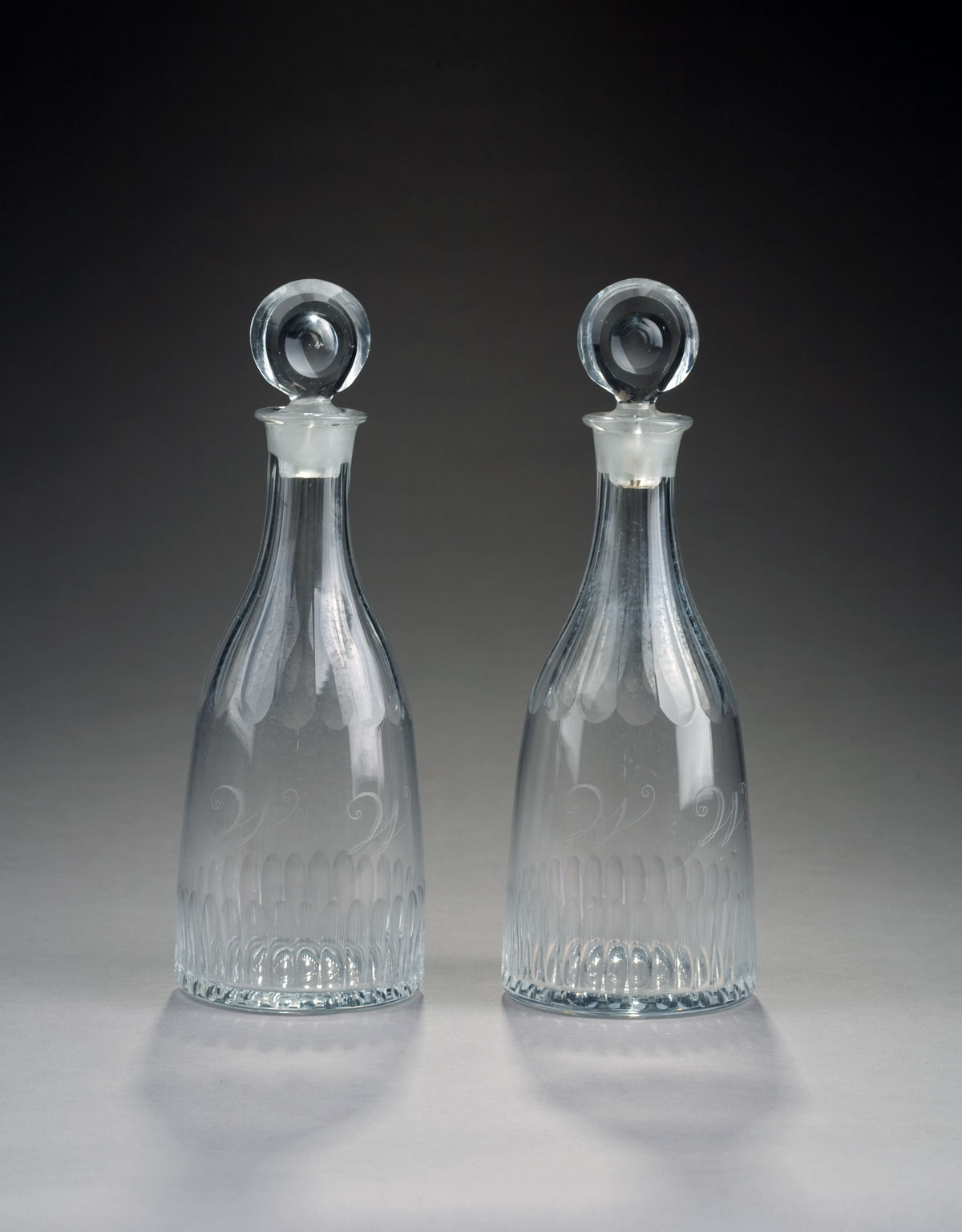 Appraisal: JOHN WAY'S PAIR OF ENGRAVED COLORLESS BLOWN GLASS MASONIC DECANTERS