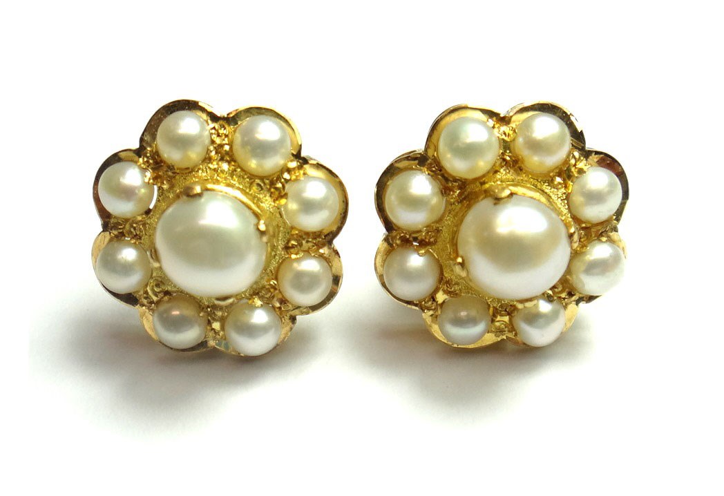 Appraisal: A pair of gold and cultured pearl cluster earstuds each