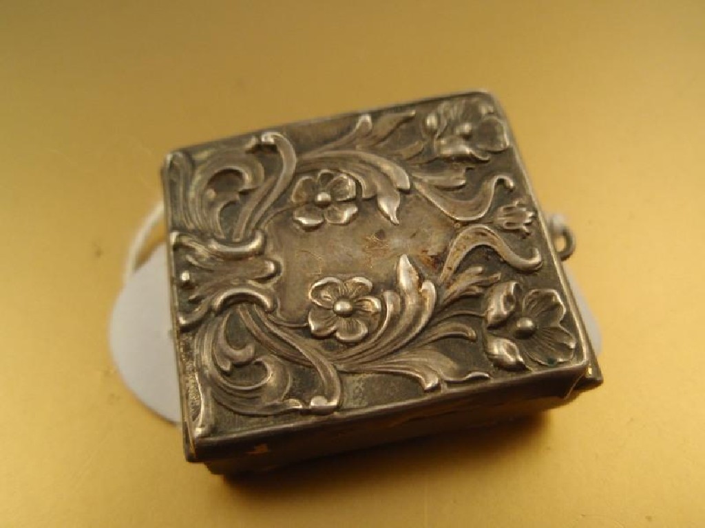 Appraisal: An early thC white metal stamp box with floral embossed