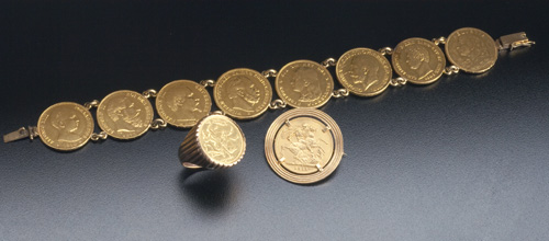 Appraisal: Gold coin jewelry Sovereign set as a brooch Isle of