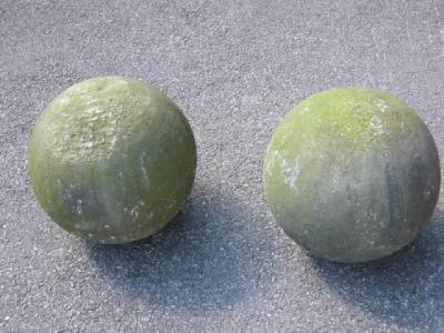 Appraisal: A PAIR OF STONE BALLS th century high