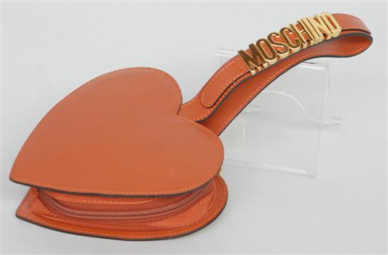 Appraisal: A MOSCHINO HEART SHAPED PURSE Purse in brown leather H