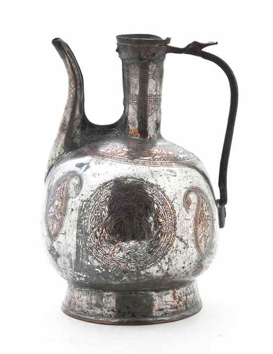 Appraisal: A Middle Eastern Silvered Copper Ewer of bulbous form set