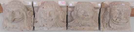 Appraisal: A SET OF FOUR CARVED STONE HEADS Decorative quality H