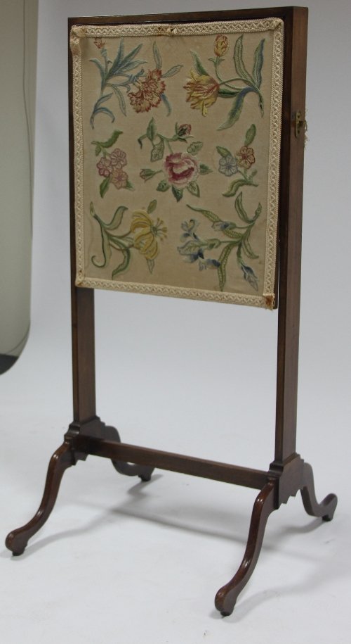 Appraisal: A George III mahogany fire screen escritoire on outsplayed legs