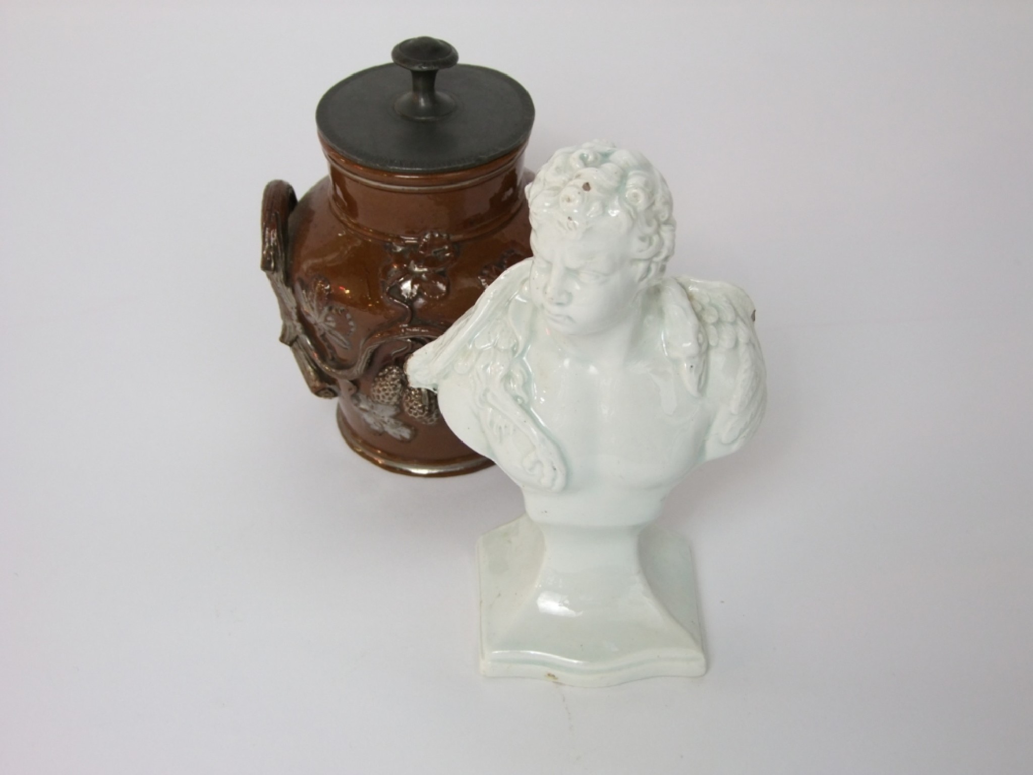 Appraisal: A late th century Leeds Pottery type white glazed bust