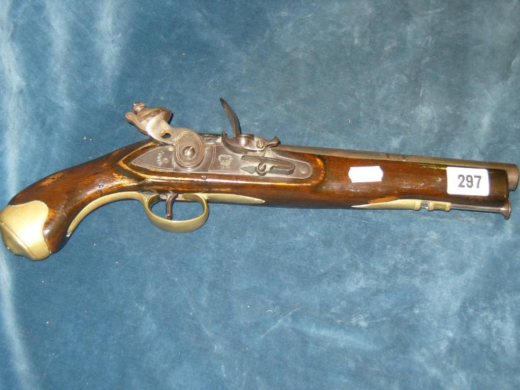 Appraisal: A Georgian tower flintlock pistol with walnut stock and brass