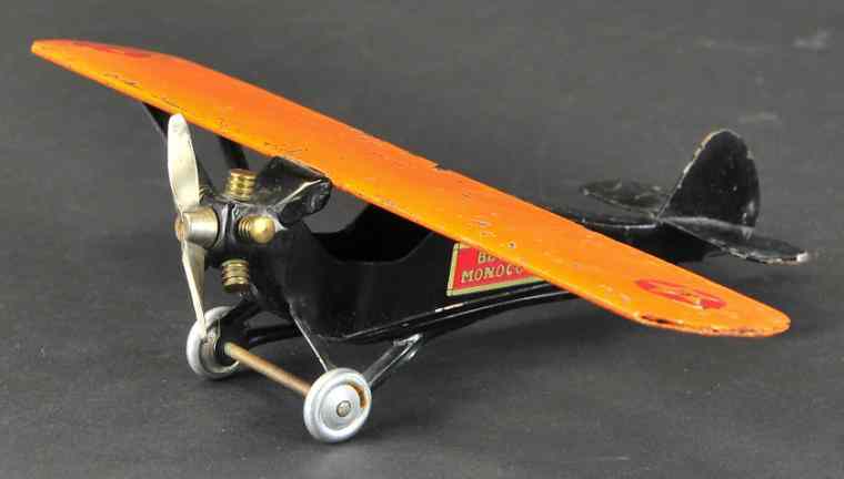 Appraisal: BUDDY 'L' MONOCOUPE Pressed steel black fuselage orange wings ''BL''