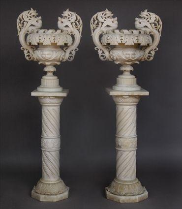 Appraisal: PAIR OF ITALIAN CARVED MARBLE URNS ON STANDS ft in